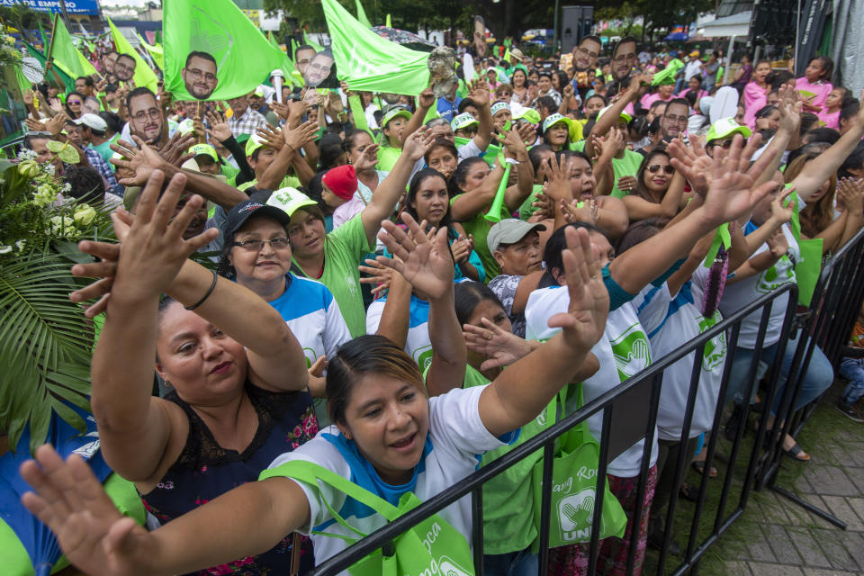 Supporters cheer for Sandra Torres, presidential candidate of the National Unity of Hope party, UNE, during her closing campaign rally prior to Sunday's general elections, in Villanueva, Friday, June 14, 2019. (AP Photo/Moises Castillo)