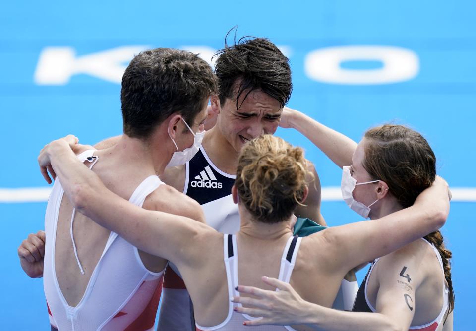 Great Britain’s Jonathan Brownlee, Alex Yee, Jessica Learmonth and Georgia Taylor Brown celebrate gold (Danny Lawson/PA) (PA Wire)