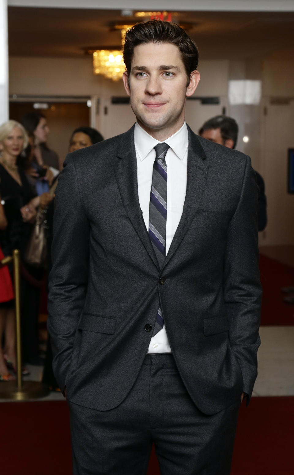 Actor John Krasinski poses for photographers on the red carpet before entertainer Ellen DeGeneres receives the 15th annual Mark Twain Prize for American Humor at the Kennedy Center, Monday, Oct. 22, 2012, in Washington. (AP Photo/Alex Brandon)