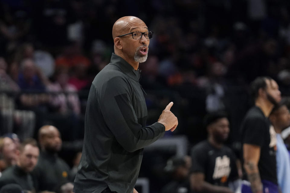 FILE - Phoenix Suns head coach Monty Williams gestures during the second half of Game 3 of an NBA basketball second-round playoff series against the Dallas Mavericks, Friday, May 6, 2022, in Dallas. Williams led the Suns to the league's best regular-season record and was one of 15 people of color working as league head coaches last season according to a diversity study examining the league. (AP Photo/Tony Gutierrez, File)