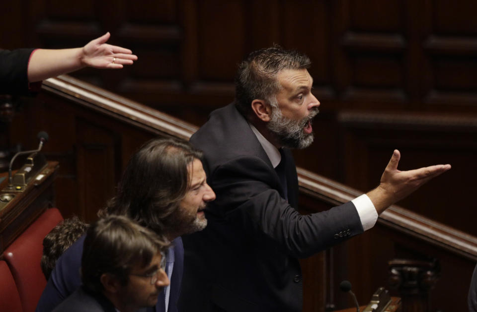 Right wing legislators shout their disapproval as Italian Premier Giuseppe Conte intervenes in the parliament debate ahead of confidence vote later at the Lower Chamber in Rome, Monday, Sept. 9, 2019. Conte is pitching for support in Parliament for his new left-leaning coalition ahead of crucial confidence votes. (AP Photo/Gregorio Borgia)