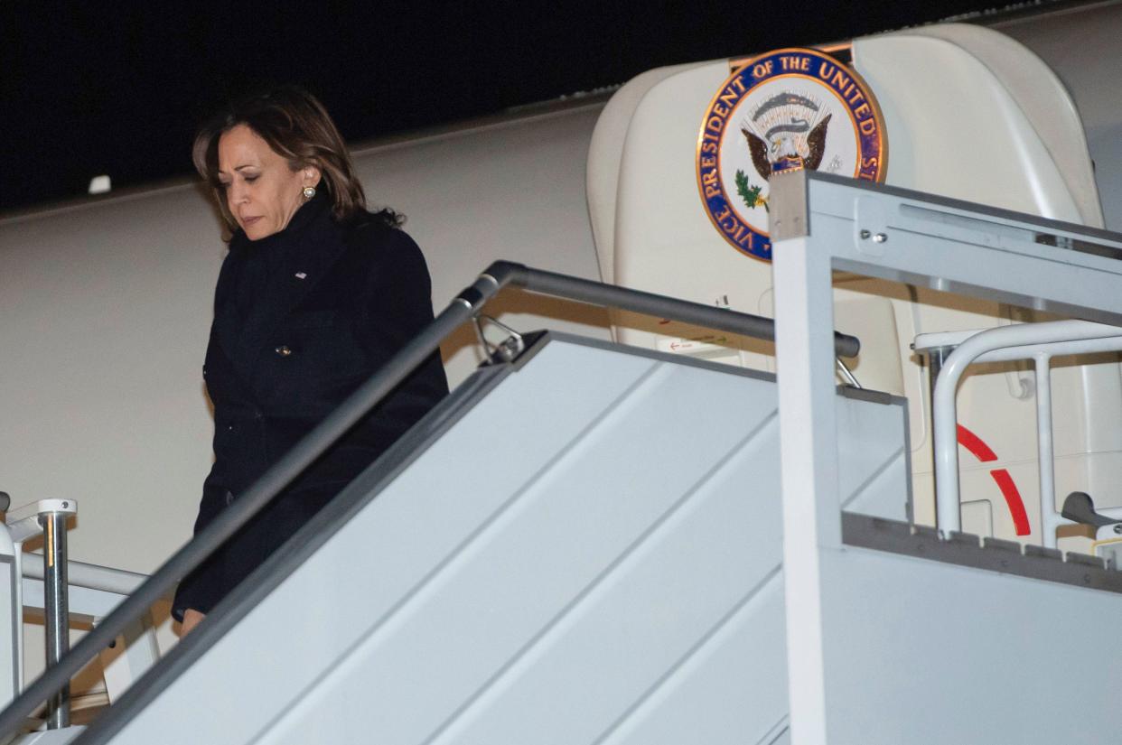 U.S. Vice President Kamala Harris disembarks from Air Force Two upon arrival at Warsaw Chopin Airport in Warsaw, Poland, Wednesday, March 9, 2022, as she travels on a 3-day trip to Poland and Romania for meetings about the war in Ukraine. (Saul Loeb/Pool via AP)