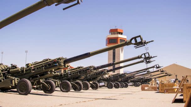 PHOTO: U.S. Marine Corps M777 towed 155 mm howitzers are staged on the flight line prior to being loaded onto a U.S. Air Force C-17 Globemaster III aircraft bound for Europe for delivery to Ukrainian forces, at March Air Reserve Base, April 22, 2022. (Cpl. Austin Fraley/U.S. Marines via Reuters)