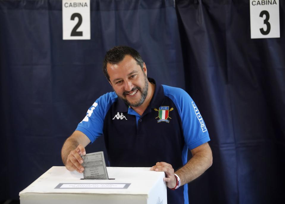 Italian Interior Minister and Deputy Premier Matteo Salvini, of the League, casts his ballot for the European Parliament elections, at a polling station in Milan, Italy, Sunday, May 26, 2019. Pivotal elections for the European Union parliament reach their climax Sunday as the last 21 nations go to the polls and results are announced in a vote that boils down to a continent-wide battle between euroskeptic populists and proponents of closer EU unity. (AP Photo/Antonio Calanni)