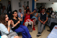 <p>Football fans in Tunisian restaurant Sidi Bou in London watch the match.<br>(Picture: SWNS) </p>