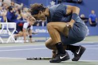Rafael Nadal of Spain celebrates a point against Novak Djokovic of Serbia in their men's final match at the U.S. Open tennis championships in New York, September 9, 2013. REUTERS/Ray Stubblebine (UNITED STATES - Tags: SPORT TENNIS TPX IMAGES OF THE DAY)