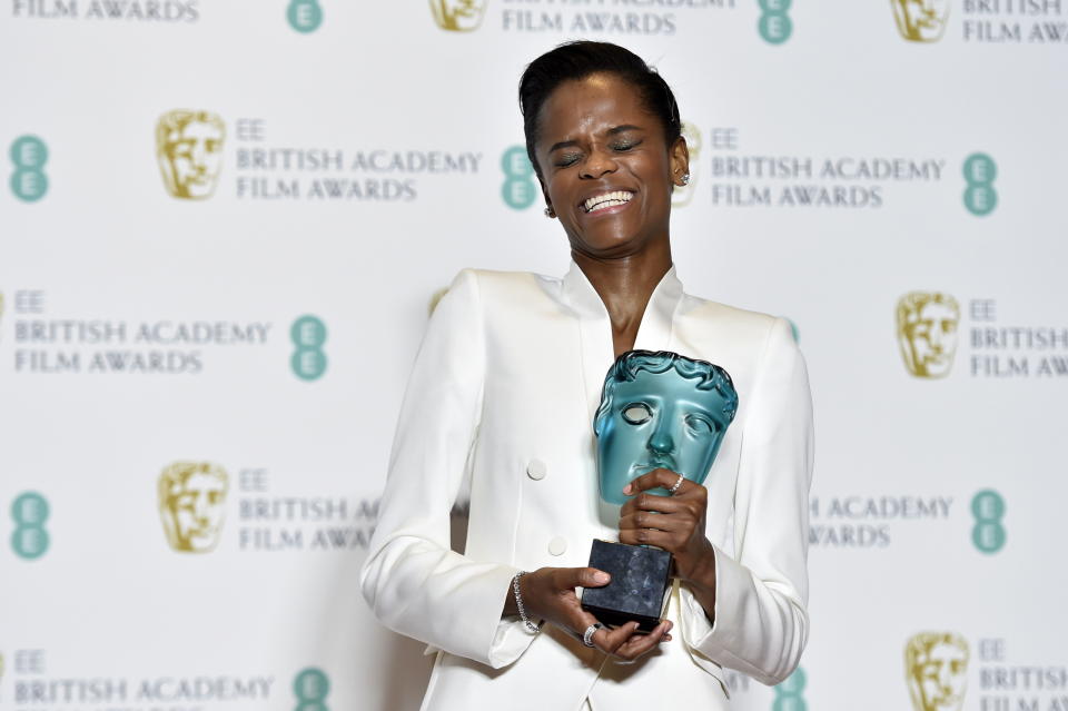 Letitia Wright poses with her Rising Star award in the press room during the 72nd annual British Academy Film Awards (Credit: EFE/EPA/NIK HALLEN)