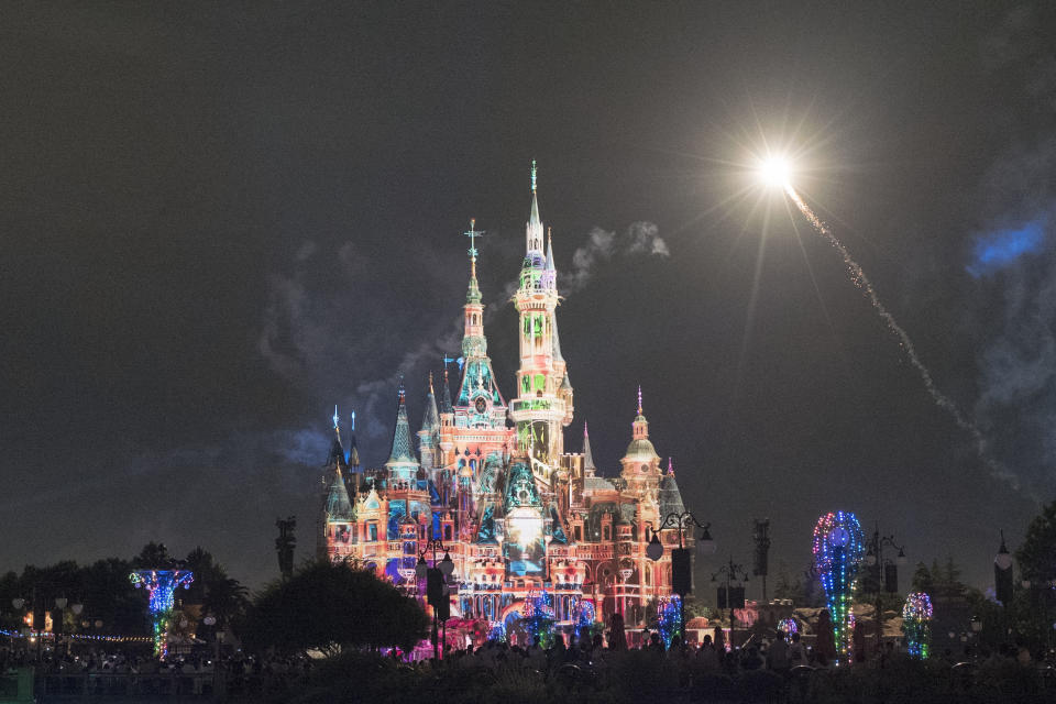 SHANGHAI, CHINA - JUNE 30: Fireworks explode over the Enchanted Storybook Castle at the Shanghai Disney Resort on the reopening day on June 30, 2022 in Shanghai, China. Shanghai Disney Resort reopened on Thursday after more than three months of closure due to the COVID-19 outbreak. (Photo by VCG/VCG via Getty Images)