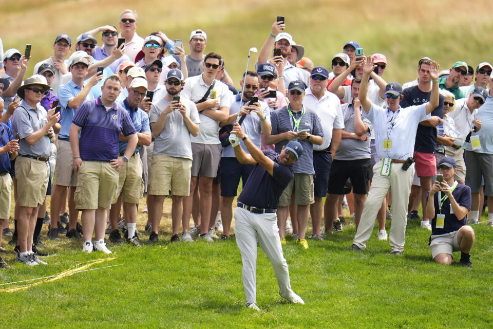 Phil Mickelson hits on the third hole during the second round of the U.S. Open golf tournament at The Country Club, Friday, June 17, 2022, in Brookline, Mass. (AP Photo/Julio Cortez)