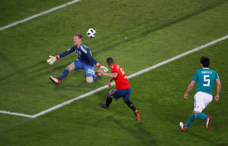 Soccer Football - International Friendly - Germany vs Spain - ESPRIT arena, Dusseldorf, Germany - March 23, 2018 Spain’s Rodrigo scores their first goal past Germany’s Marc-Andre ter Stegen REUTERS/Wolfgang Rattay