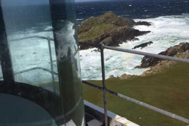 A  view of crashing waves from the lighthouse