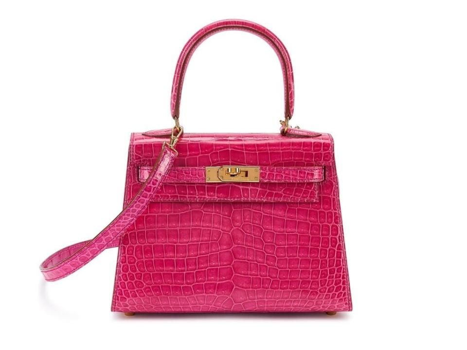 Mini pink Hermes Kelly bag with top handle and gold hardware