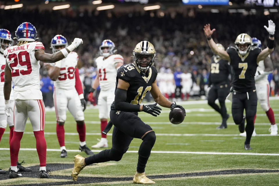 New Orleans Saints wide receiver Keith Kirkwood celebrates after scoring during the first half of an NFL football game against the New York Giants Sunday, Dec. 17, 2023, in New Orleans. (AP Photo/Gerald Herbert)