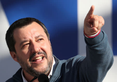 FILE PHOTO: Leader of right-wing League party and Italian Interior Minister Matteo Salvini gestures as he speaks during a rally in Rome, Italy, December 8, 2018. REUTERS/Alessandro Bianchi/File Photo