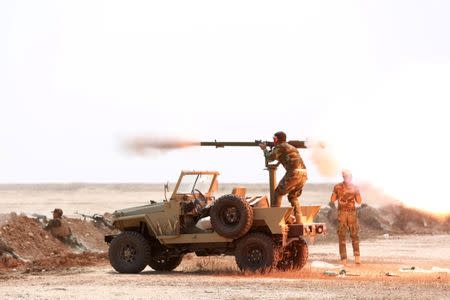 Members of the Shi'ite Badr Organisation undergo training before the upcoming battle to recapture Mosul in Diyala province, Iraq September 27, 2016. REUTERS/Stringer