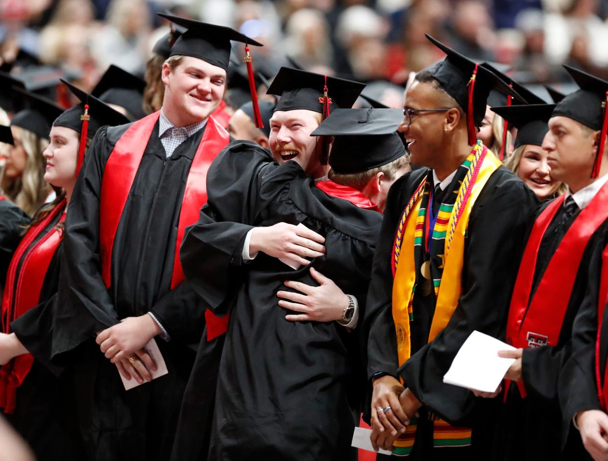 Two soon-to-be graduates hug during the ceremony. Texas Tech University held one of its Fall 2022 Commencement ceremonies at the United Supermarkets Arena Saturday, Dec. 17, 2022.
(Photo: Mark Rogers/For the Avalanche-Journal)