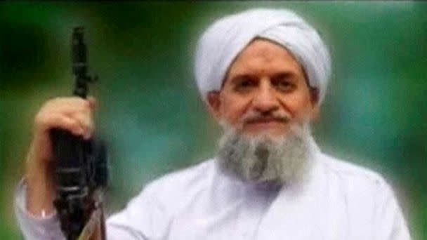 PHOTO: A photo of Al Qaeda's new leader, Egyptian Ayman al-Zawahiri, is seen in this still image taken from a video released on September 12, 2011. (Site Monitoring Service/Reuters)