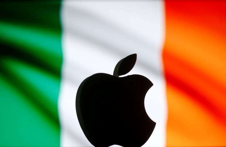 A 3D printed Apple logo is seen in front of a displayed Irish flag. REUTERS/Dado Ruvic/Illustration