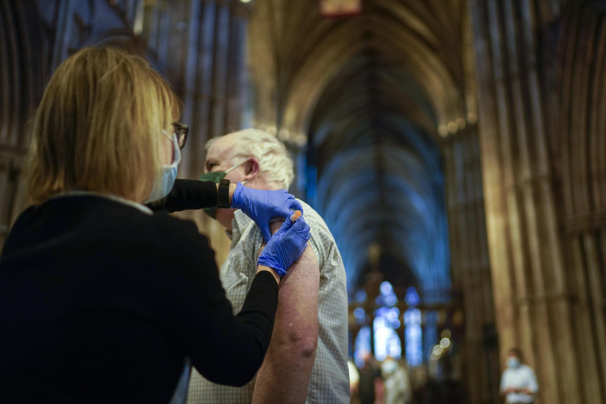 LICHFIELD, ENGLAND - FEBRUARY 26: Members of the public receive their Covid-19 vaccinations at Lichfield Cathedral, Staffordshire on February 26, 2021 in Lichfield, England. Lichfield Cathedral is one of many unusual venues that have been adapted for administering vaccines during the Covid-19, coronavirus pandemic. Over 19 million people in the United Kingdom have had their first Covid-19 vaccination, including 90 percent of over-70s.  (Photo by Christopher Furlong/Getty Images)