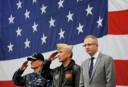 (L-R) U.S. Navy Rear Admiral Marc Dalton, Commander of the U.S. Pacific Command Admiral Harry Harris and Australian Minister for Urban Infrastructure Paul Fletcher participate in a ceremony marking the start of Talisman Saber 2017, a biennial joint military exercise between the United States and Australia aboard the USS Bonhomme Richard amphibious assault ship in the Pacific Ocean off the coast of Sydney, Australia, June 29, 2017.REUTERS/Jason Reed