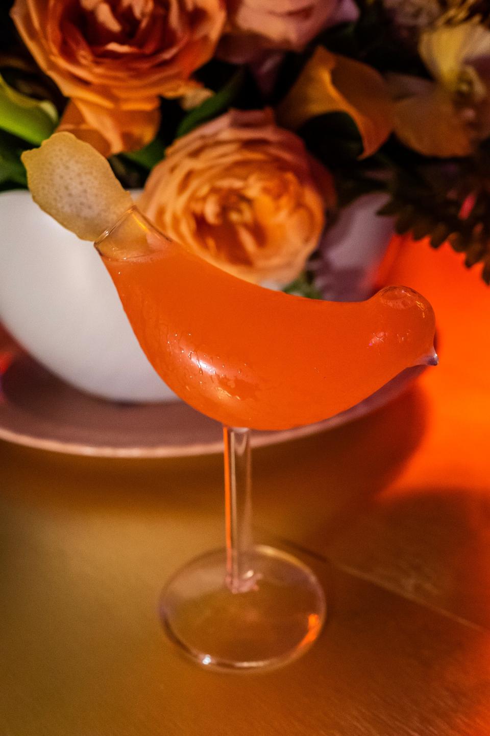 Drinking out of a bird-shaped glass is half the fun of ordering the "Lovebird."