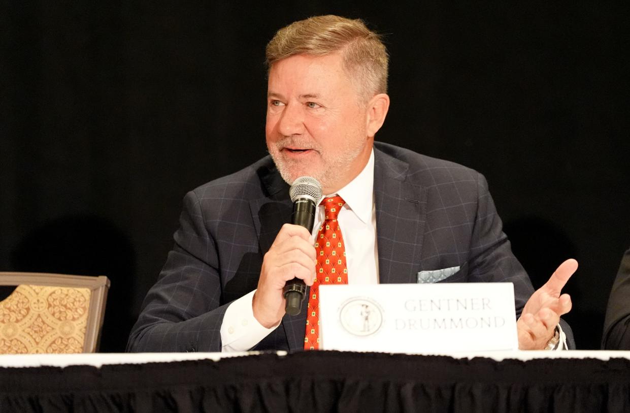 Attorney General Gentner Drummond speaks during the Sovereignty Symposium on Tuesday in Oklahoma City, where he was joined by a panel of tribal officials and other public leaders.