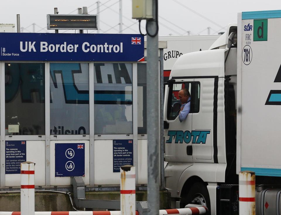 <p>A lorry passes through UK Border Control</p> (PA Archive/PA Images)