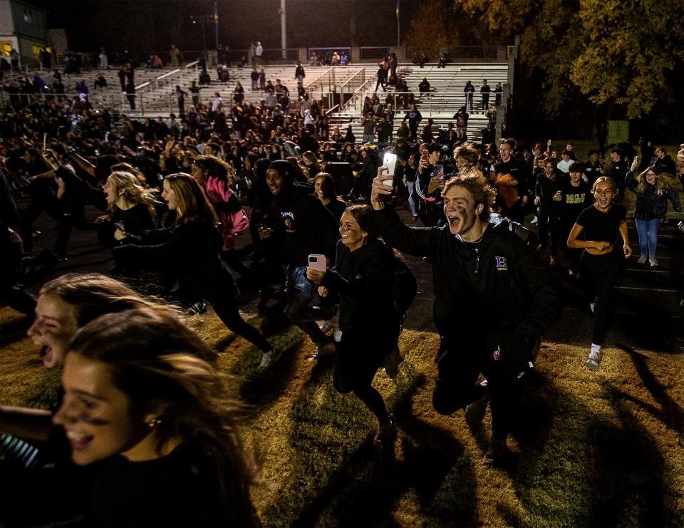 Male fans stormed the field in premature jubilation with .02 seconds to go as the Bulldogs defeated the Manual Crimsons 14-3 on Friday night, Oct. 28, 2022