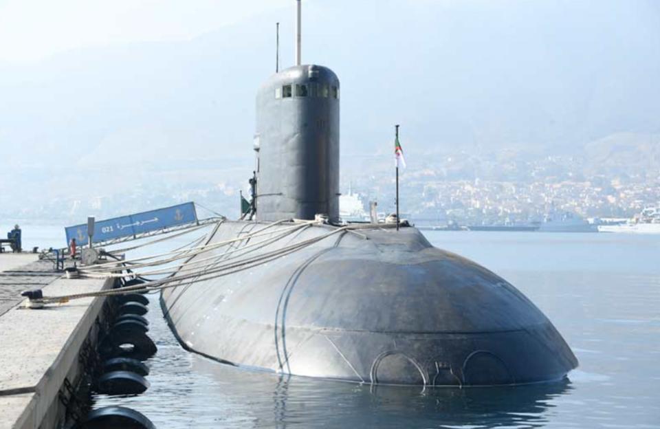 The top of an Algerian submarine in the water