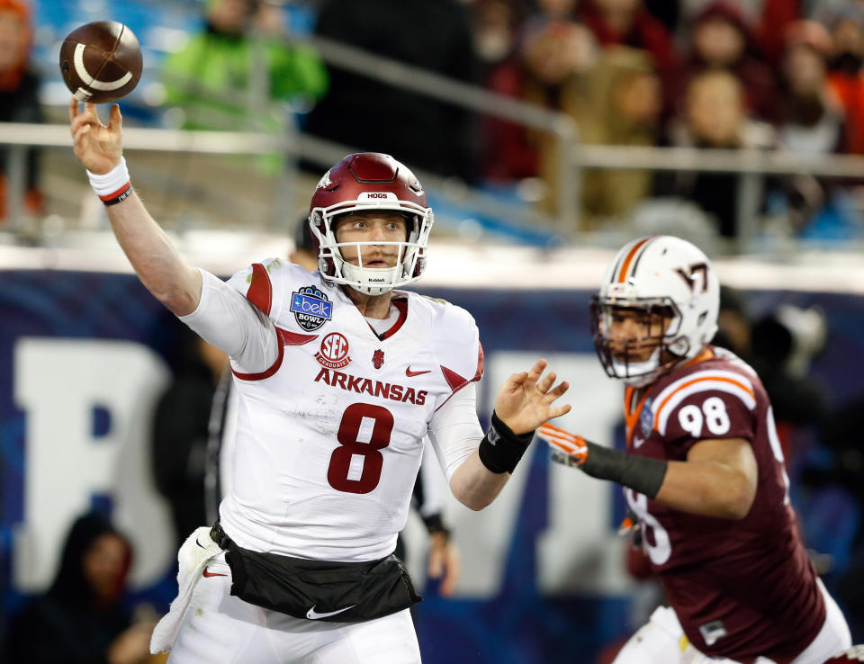 Dec 29, 2016; Charlotte, NC, USA; Arkansas Razorbacks quarterback Austin Allen (8) passes the ball during the fourth quarter against the Virginia Tech Hokies during the Belk Bowl at Bank of America Stadium. <a class="link " href="https://sports.yahoo.com/ncaaf/teams/virginia-tech/" data-i13n="sec:content-canvas;subsec:anchor_text;elm:context_link" data-ylk="slk:Virginia Tech;sec:content-canvas;subsec:anchor_text;elm:context_link;itc:0">Virginia Tech</a> defeated Arkansas 35-24. Mandatory Credit: Jeremy Brevard-USA TODAY Sports