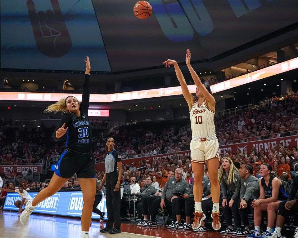 Texas guard Shay Holle shoots over BYU guard Lauren Davenport during their March 2 game at Moody Center. Holle's 3-pointer with 73 seconds left was the critical shot of Texas' Big 12 Tournament semifinal win over Kansas State.