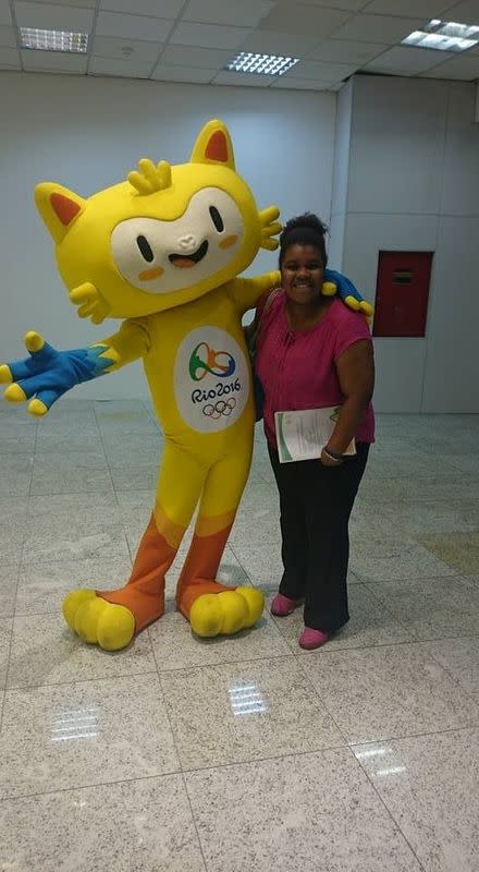 Claire Dawn-Marie Gittens poses with a Rio Olympics mascot in Rio de Janeiro