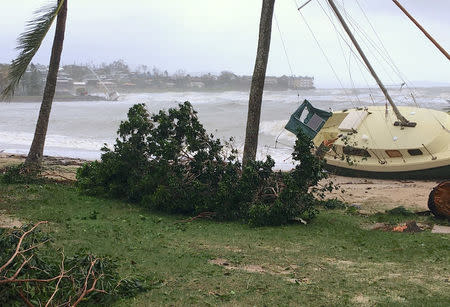 Damaged yachts can be seen along the damaged foreshore after Cyclone Debbie hit the northern Queensland town of Airlie Beach, located south of Townsville in Australia, March 29, 2017. Jan Clifford/Handout via REUTERS