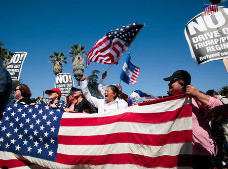 Protesters gather at McArthur Park for the May Day protest march in Los Angeles, California, U.S. May 1, 2017. REUTERS/Kyle Grillot