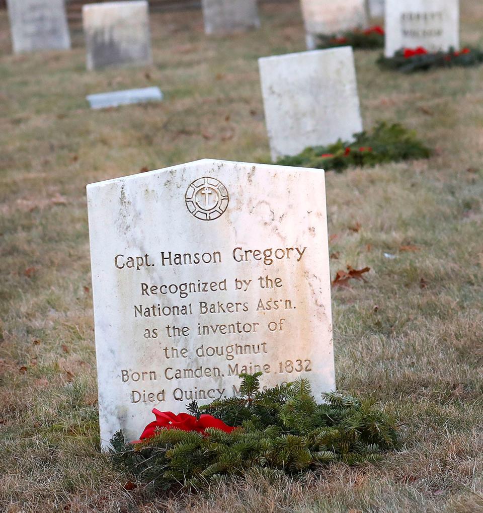 Maura O'Gara leads a walking tour of Germantown including the Sailors Snug Harbor Cemetery, where Hanson Gregory is buried. Gregory is recognized as the inventor of the doughnut.