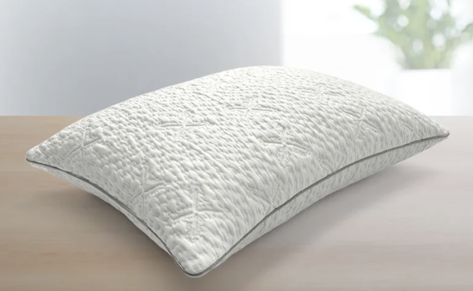 The curved Sleep Number ComfortFit pillow is the simplest yet still divine option in this sale. (Photo: Sleep Number)