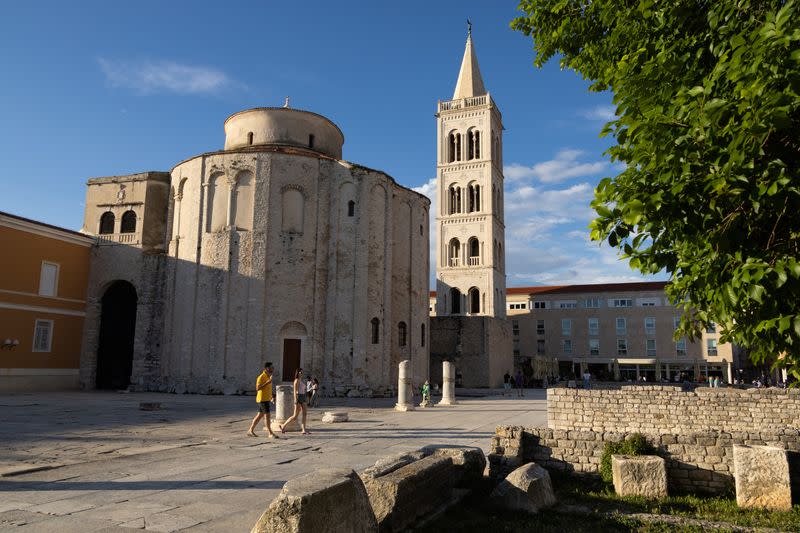 People walk in the old town of Zadar