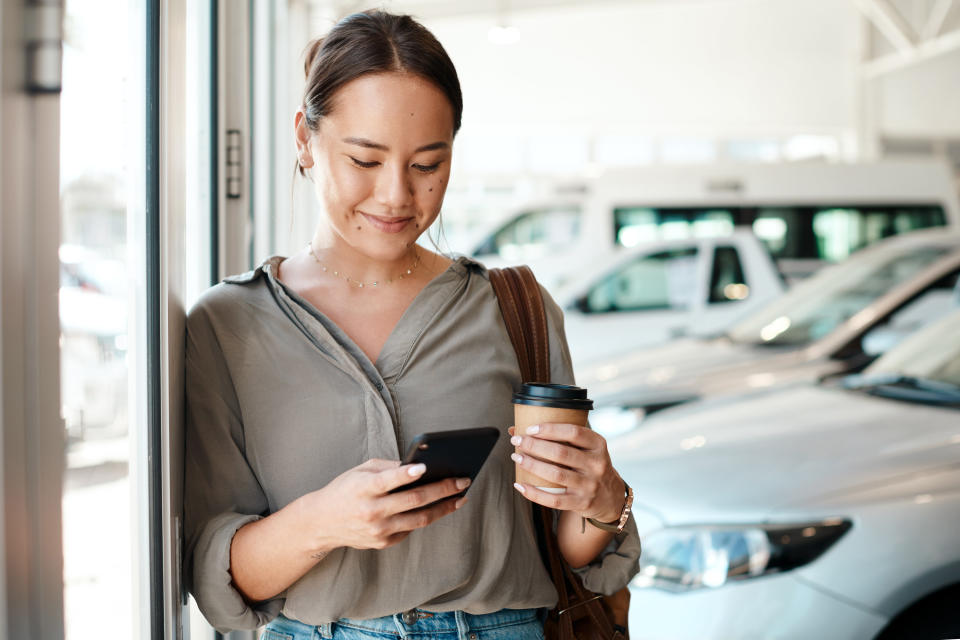 Woman gets ready to make a call on her phone