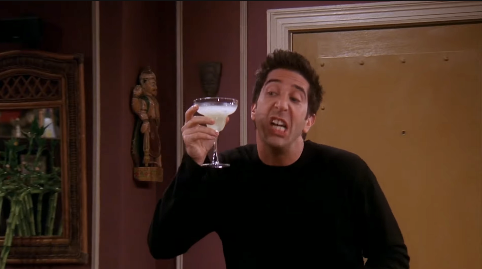 Screenshot from "Friends" of Ross holding a margarita