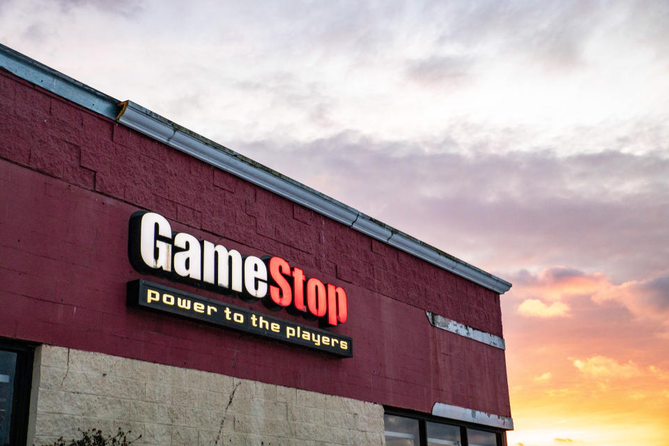 ATHENS, OHIO, UNITED STATES - 2021/02/02: GameStop logo is seen at one of their stores in Athens. Businesses that line East State Street in Athens, Ohio, an Appalachian community in southeastern Ohio. Small investors force invested heavily in Gamestop, creating the first ever short squeeze by reddit users in the online group WallStreetBets. The massive investments in Gamestop by everyday people have challenged many stock trading norms, and have upset the balance of power on Wall Street, generally dominated by hedge fund groups. (Photo by Stephen Zenner/SOPA Images/LightRocket via Getty Images)