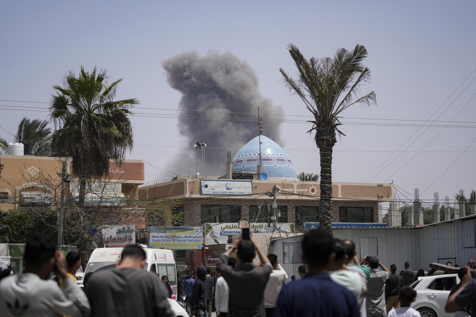 Smoke rises following an Israeli airstrike in Deir al Balah, Gaza Strip, Tuesday, April 23, 2024. (AP Photo/Abdel Kareem Hana)