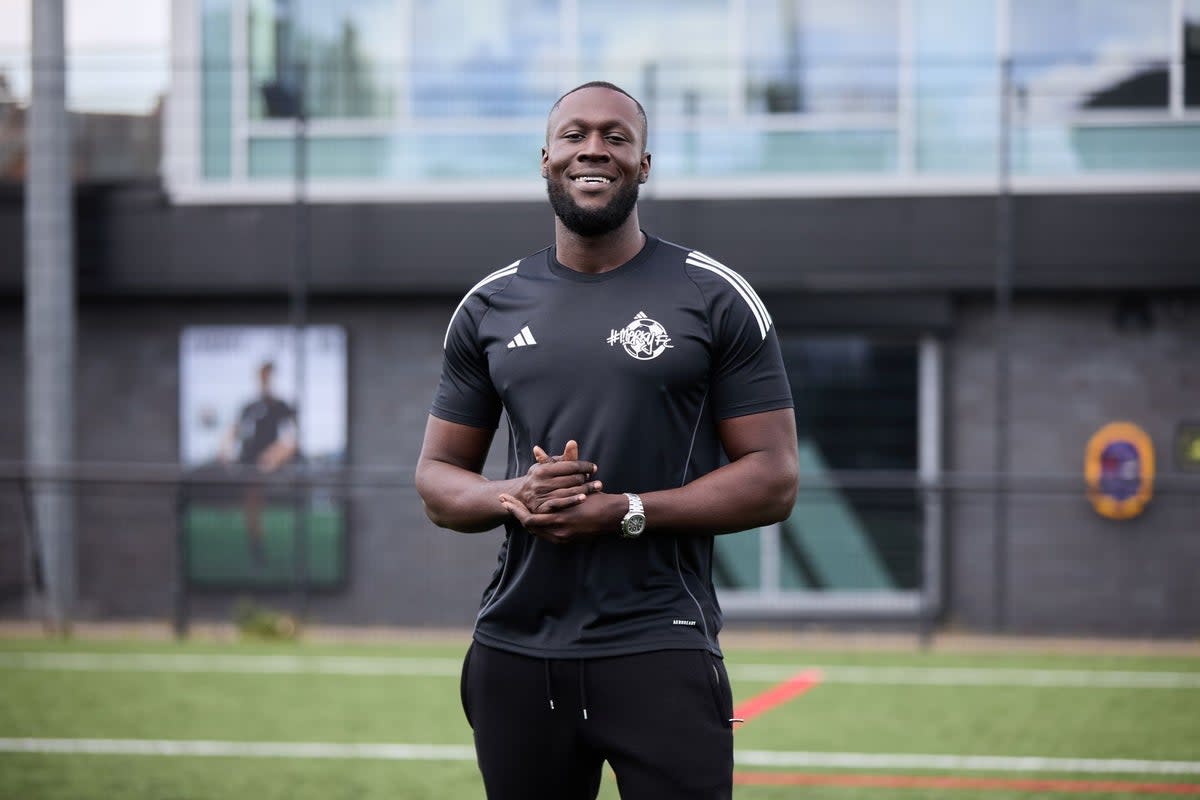 Stormzy stands outside the new football centre in Croydon (Greg Coleman - Iammrcoleman)