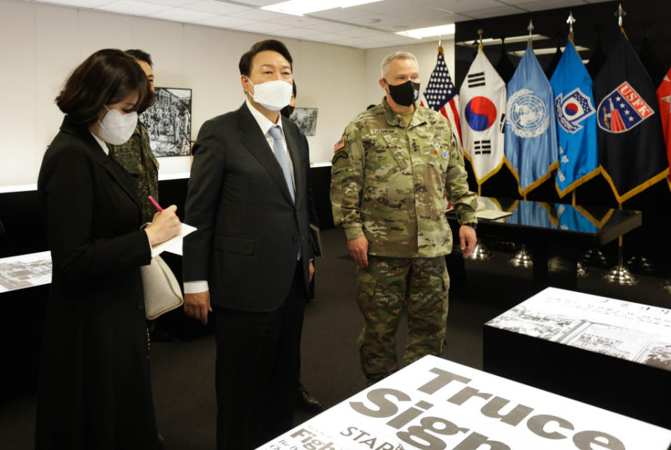 In this handout image provided by the U.S. Army, then president-elect of South Korea, Yoon Suk-yeol (2nd L) stands with Gen. Paul J. LaCamera (R) of United Nations Command/Combined Forces Command, and U.S. Forces Korea Commander, during his visit at Camp Humphreys on April 7, 2022 in Pyeongtaek, South Korea.<span class="copyright">Staff Sgt. Kris Bonet—U.S. Army via Getty Images</span>