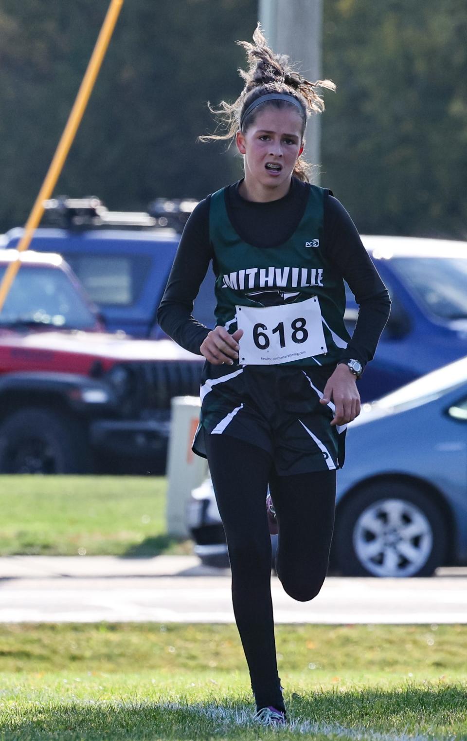 Smithville's Kaitlyn Carr races to the finish line where she finished second in the Wayne-Holmes Invitational.