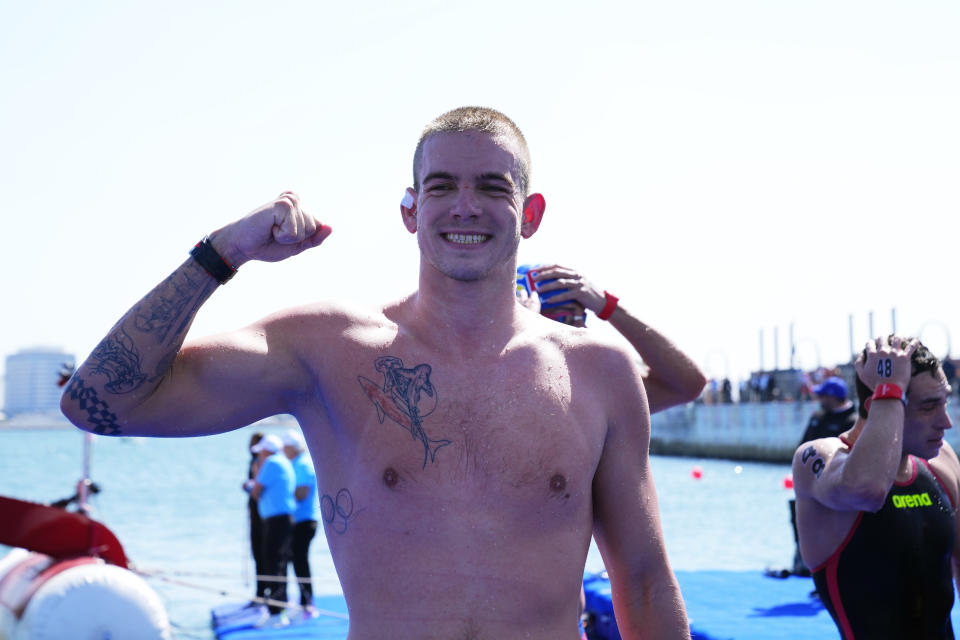 Kristof Rasovszky of Hungary reacts after winning the men's 10 km open water final at the World Aquatics Championships in Doha, Qatar, Sunday, Feb. 4, 2024. (AP Photo/Hassan Ammar)