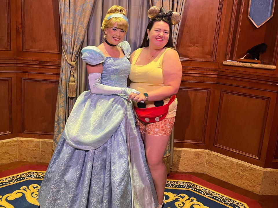 megan posing with cinderella at magic kingdom in disney world