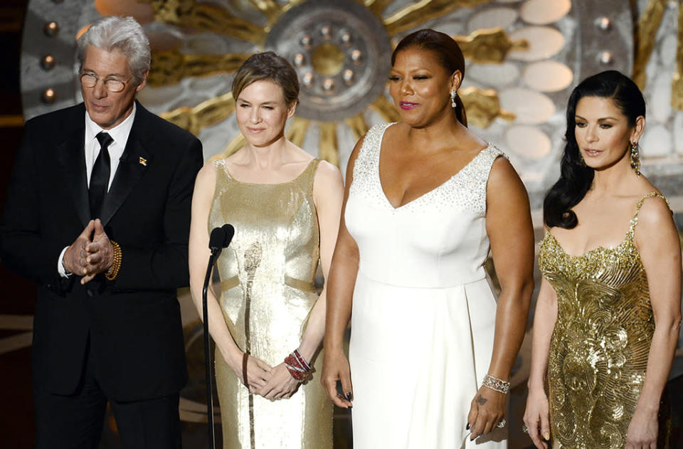 <p>The cast of the 2003 Best Picture winner 'Chicago’ — Richard Gere, Zellweger, Queen Latifah, and Catherine Zeta-Jones — reunite onstage during the Oscars on Feb. 24, 2013. (Photo: Kevin Winter/Getty Images)</p>