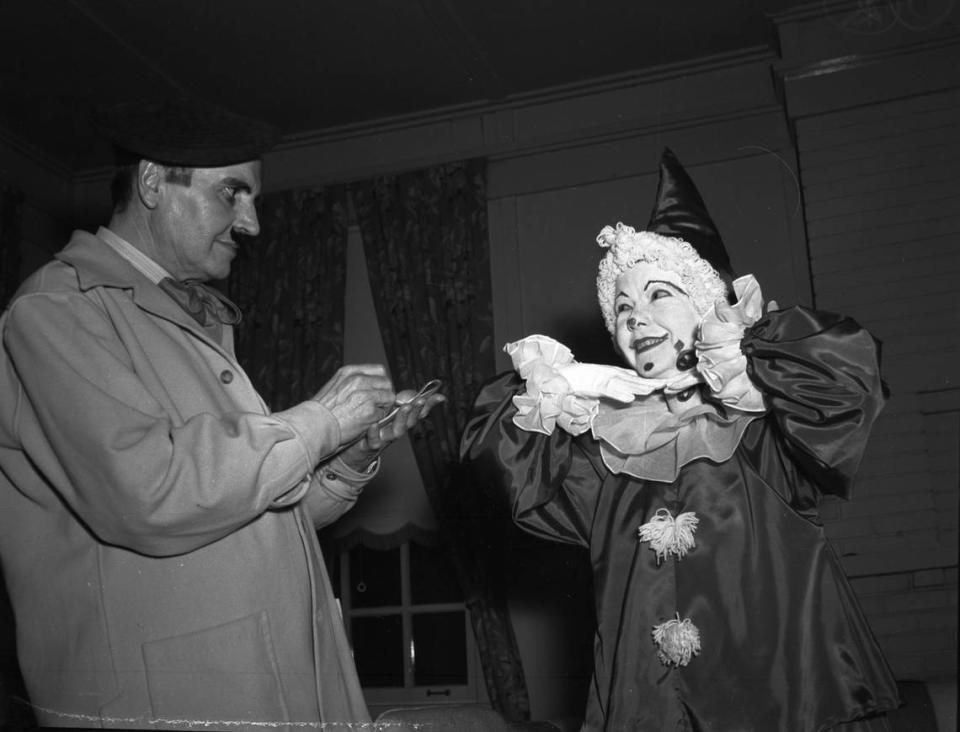 Feb. 3, 1940: A Masquerade Ball is being held at the River Crest Country Club for the benefit of the Day Nursery Association. Attending the party in their creative costume are Mr. K. H. Beall, left, and Mrs. John S. Brown.