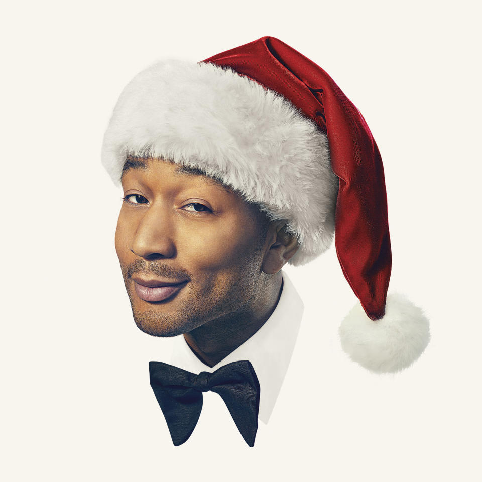 This cover image released by Columbia Records shows "A Legendary Christmas," a holiday album by John Legend. (Columbia Records via AP)