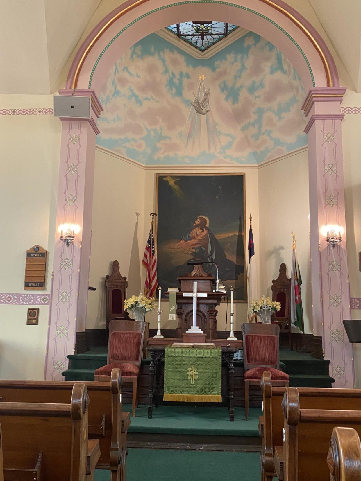 The chancel area of Rehoboth Welsh Chapel in Delta, a congregation that worships Sunday afternoons in services in English and Welsh. The congregation does not meet in February, but will resume in March. The chancel painting is unsigned, suggesting that it might have come from a painter other than two that operated in York in the 20th century – the Roth Brothers and C. Guy Stambach.